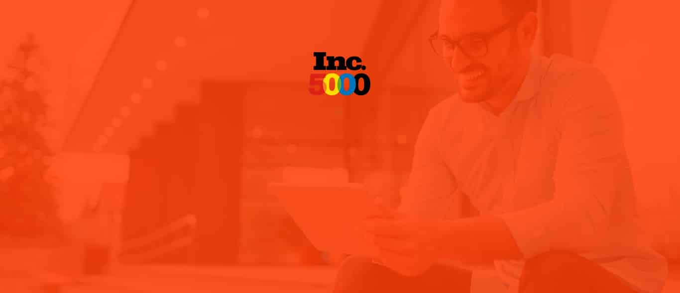 Man using tablet in background with orange overlay