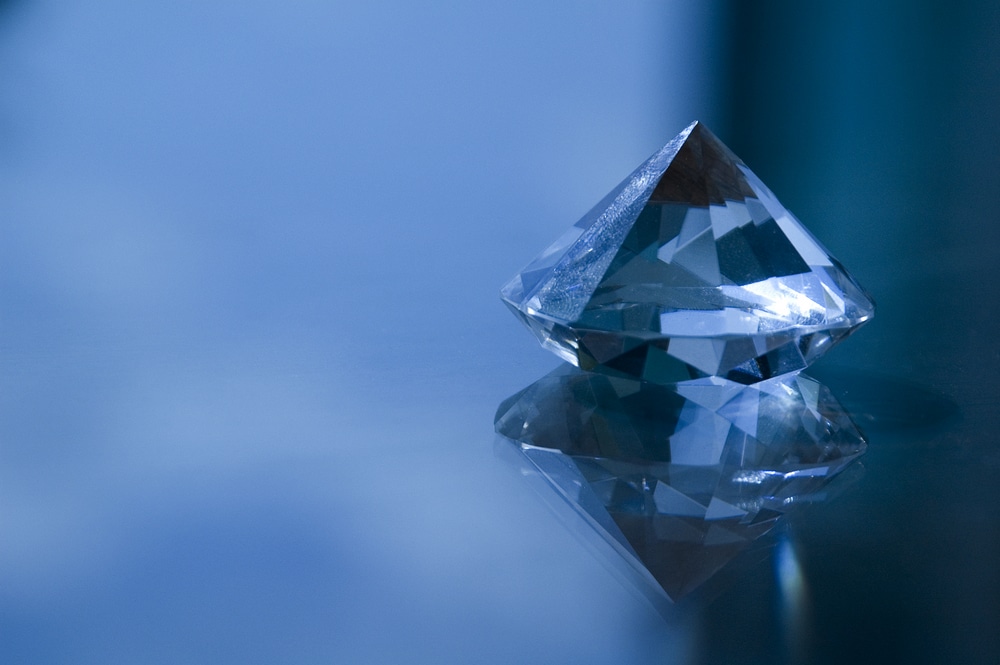 A polished diamond reflecting light, symbolizing Catalyst UX's excellence in design, strategy, and software development.